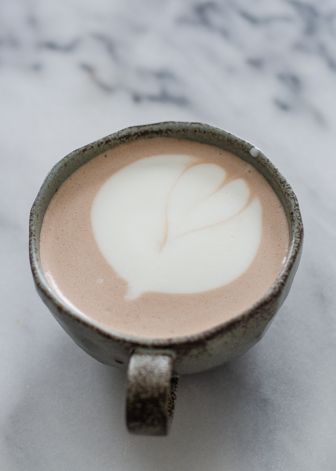 Mushroom cocoa in a mug with latte art.