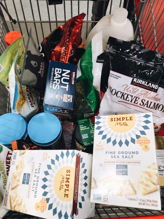 Shopping cart filled with food at Costco.