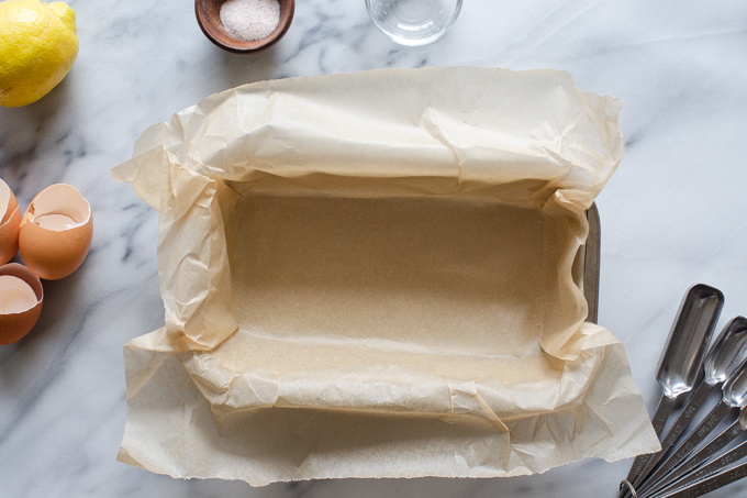 The pan lined with parchment paper.