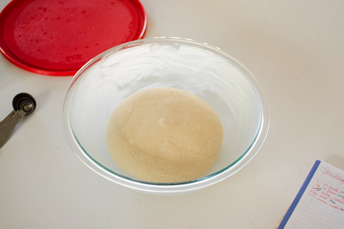 The dough for the sourdough tortillas all risen in the greased bowl.