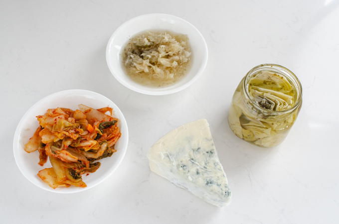 Funky snacks: kimchi, sauerkraut, artichokes, and blue cheese.