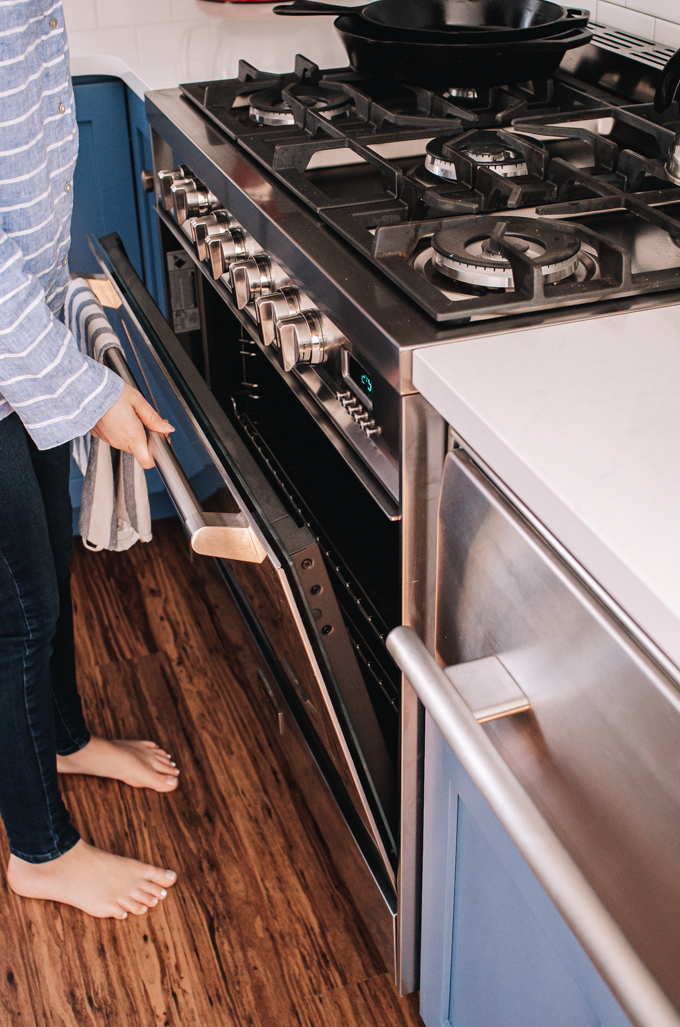 Opening the oven on the Verona Prestige dual fuel 36" range.