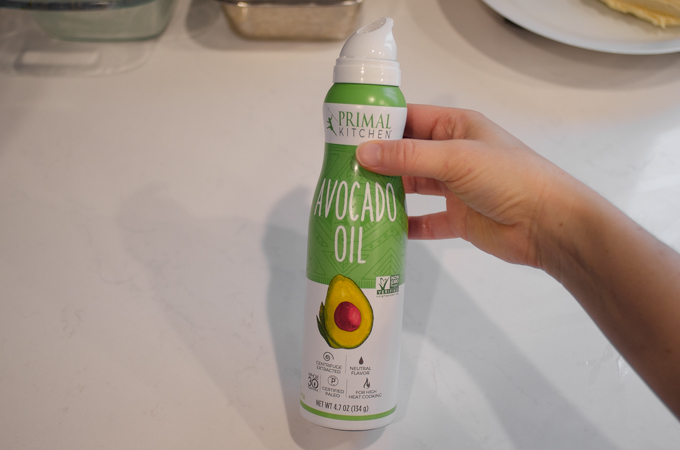 Greasing the work surface with avocado oil spray.