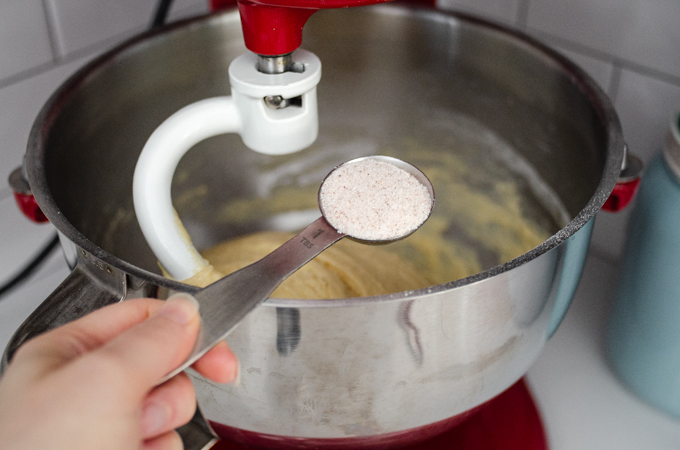 Adding the salt to the sourdough brioche dough.