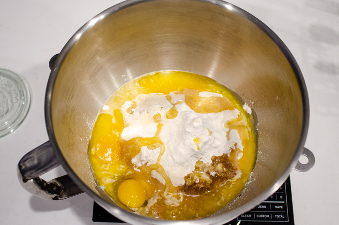 All of the ingredients in the bowl of a stand mixer