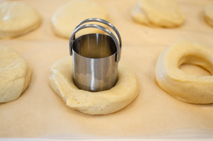 Cutting out the sourdough donut holes.