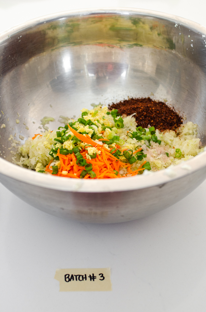 Kraut-chi made with garlic, ginger, carrots, green onions, and gochugaru (Korean red pepper flakes).