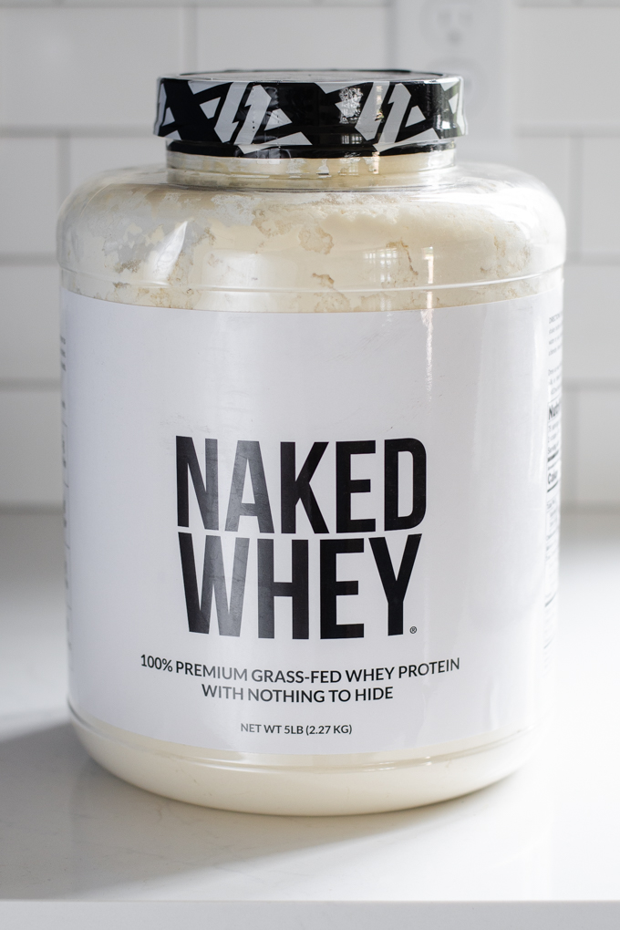 A 5 pound container of Naked Whey grass-fed protein powder from Naked Nutrition. 