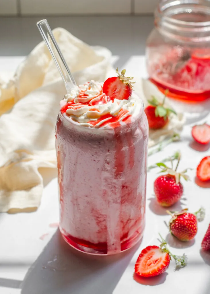 Premium Photo  Tasty fresh milk shakes in plastic cups on white